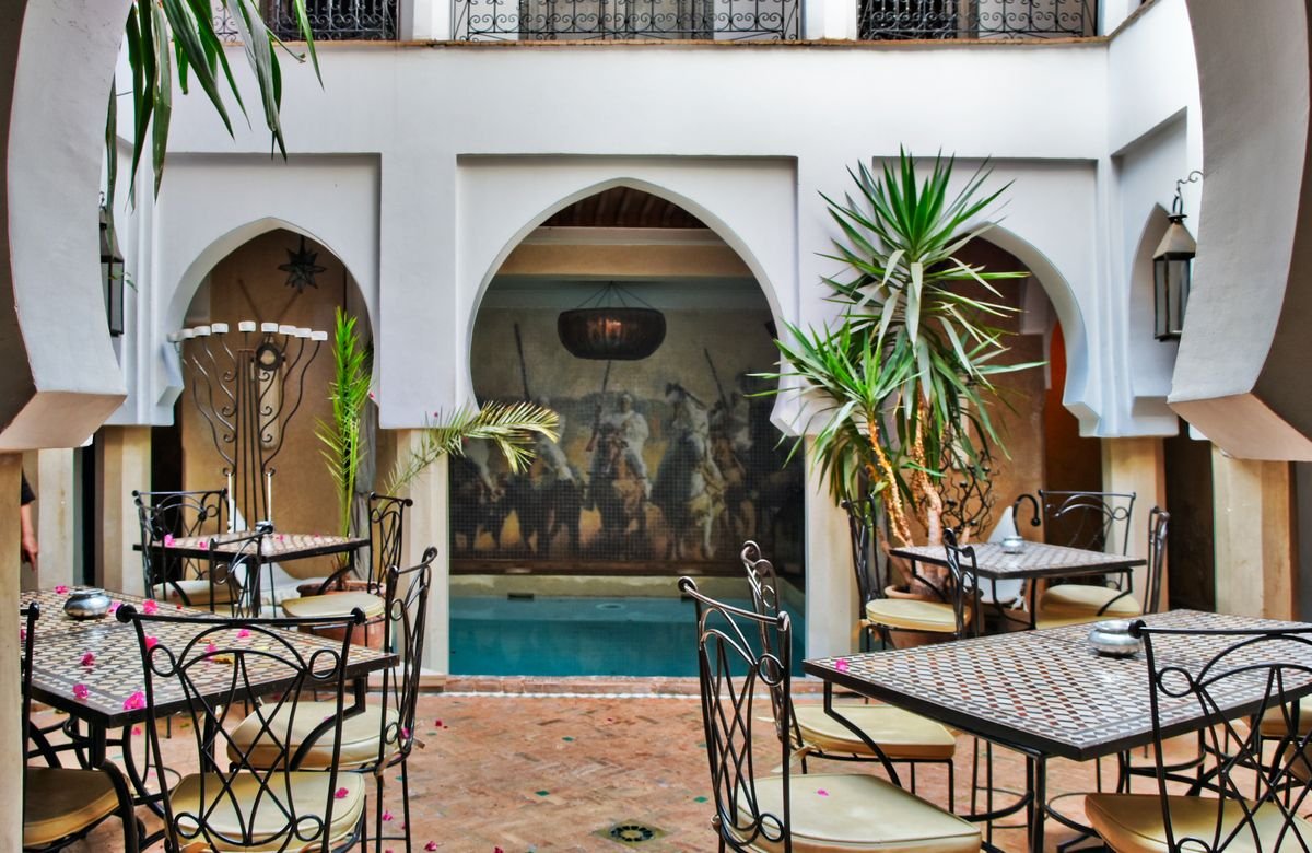 Moroccan courtyard design with small pool, reflecting Riad Be Marrakech's artistic Bab Doukkala setting